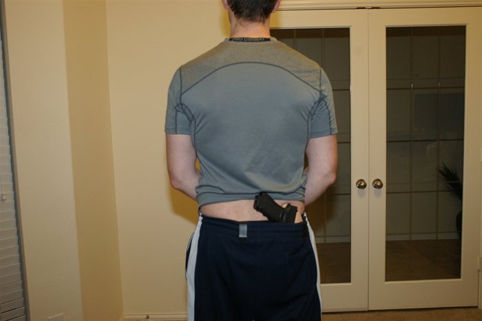 IWB Crossbreed Supertuck style Holster Concealing Glock 17 back view with Shirt Up